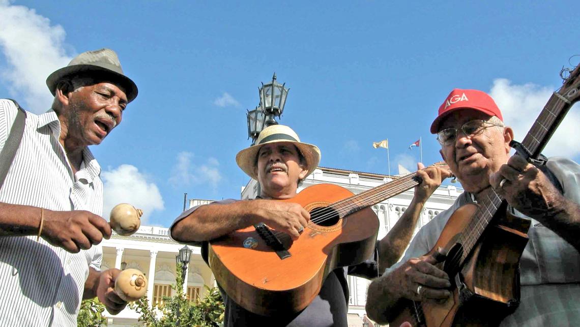A trio of musicians in Parque Cespedes in Santiago de Cuba