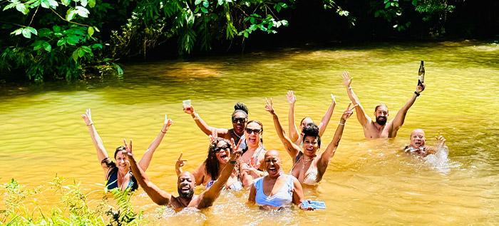 Group taking a bath in a river