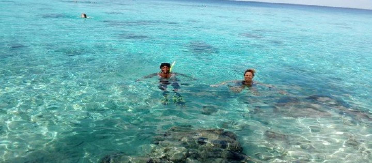 two snorkelers bob in the aquamarine waters of the Bay of Pigs