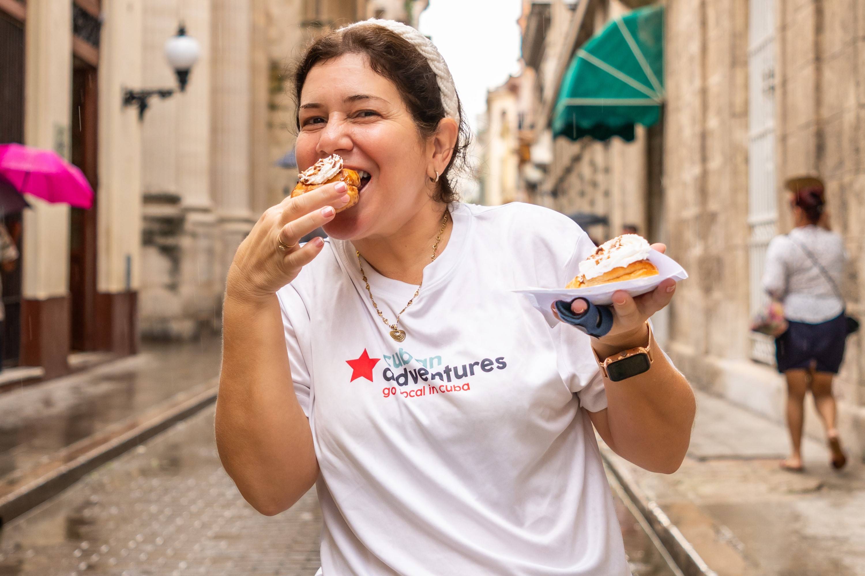 Tour leader eating street sweets Tour leader eating street sweets