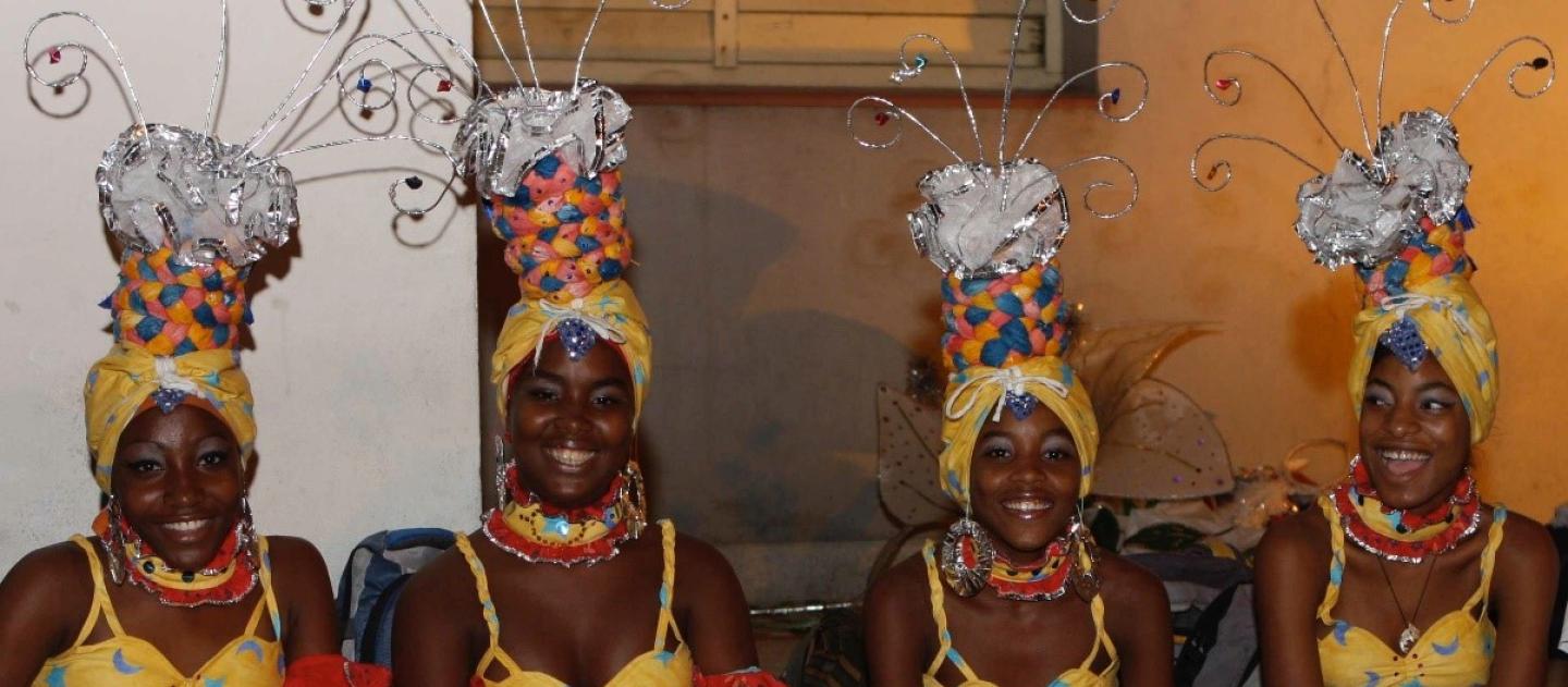 women elaborate costumed for Santiago carnival